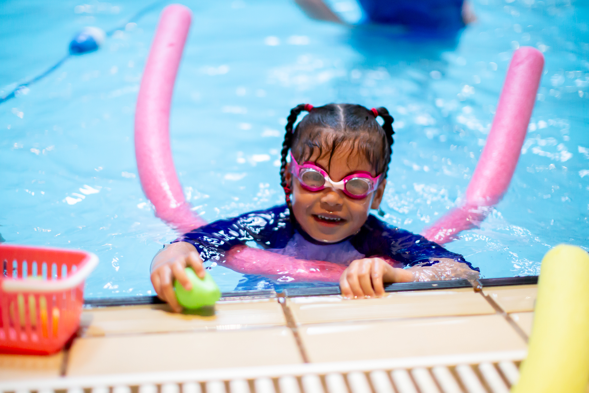 Child learning to swim